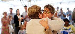 Superintendent Patricia Green embraces and recognizes Cathy Cieglo at the retirement party on Tuesday, June 18. Cieglo has taught for 18 years. Daniel Brenner I AnnArbor.com